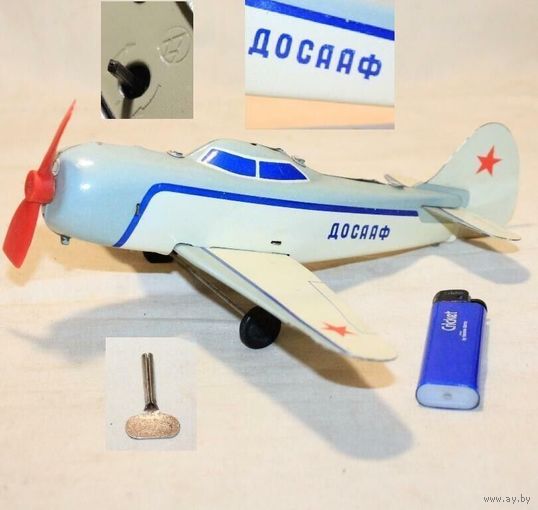 Жестяная механическая игрушка СССР Самолет ДОСААФ