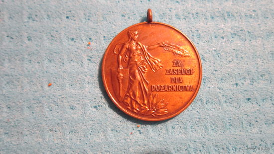 Медаль польская за заслуги при тушении пожаров. Девушка с веткой и щитом.