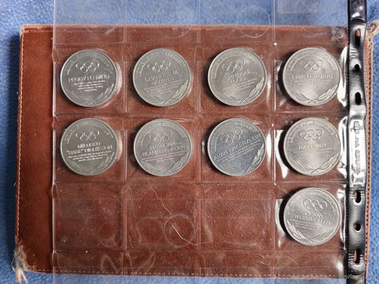 Монеты-жетоны олимпийские чемпионы