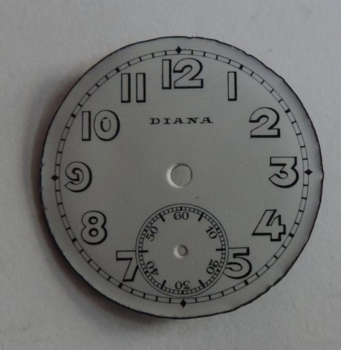 Эмалевый циферблат на наручные часы "DIANA" до 1917г. Диаметр 3.3 см.