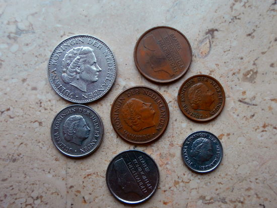 Нидерланды 7 монет: 1 гульден, 25 центов, 10 центов, 5 центов, 1 цент.